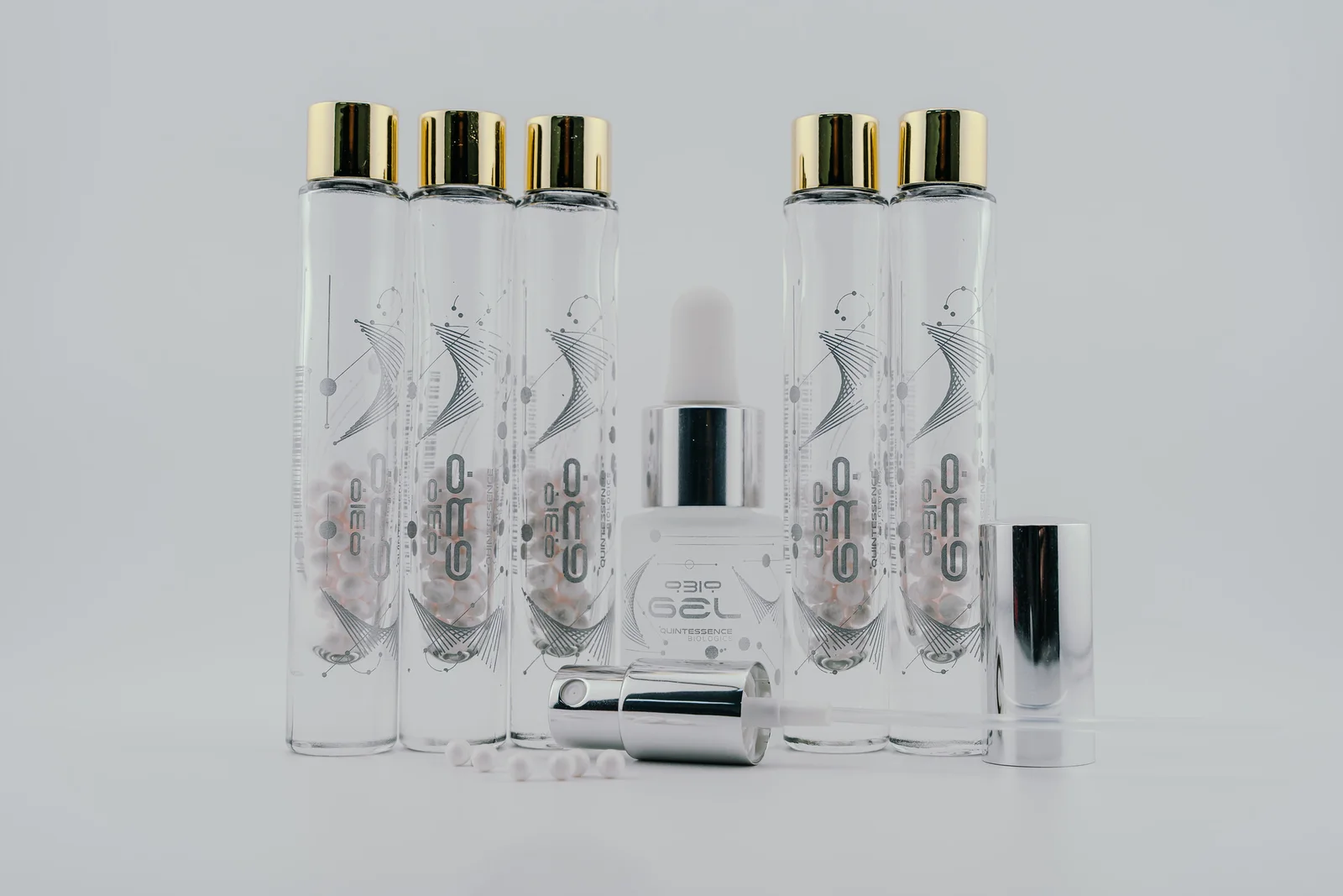 Five QBio Gro vials, silver-collar QBio Gel and the photographed mister and cap.